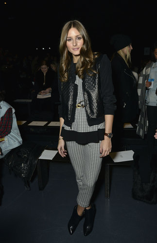At the Tibi show in NYC, Olivia doubled up on checks by styling her matching Tibi separates with a quilted jacket and black ankle boots.
At the Tibi show in NYC, Olivia doubled up on checks by styling her matching Tibi separates with a quilted jacket and black ankle boots.