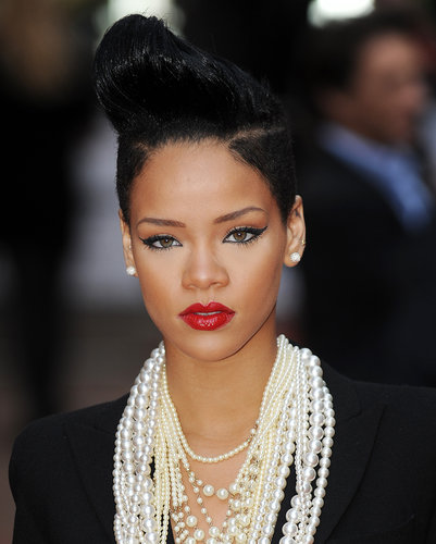 At Inglourious Basterds premiere in 2009, she paired this pompadour updo with winged eyeliner and a glossy red lip.
At Inglourious Basterds premiere in 2009, she paired this pompadour updo with winged eyeliner and a glossy red lip.