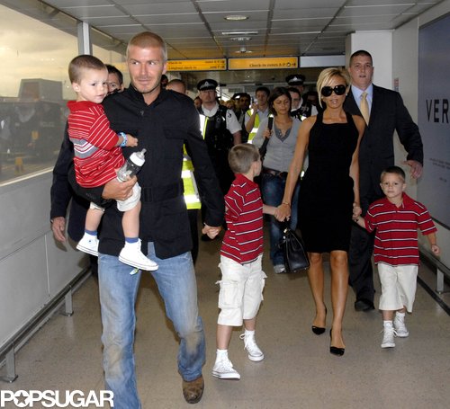 The young Beckham boys wore matching polos for a walk through London's Heathrow Airport in July 2007 with Mom and Dad.
The young Beckham boys wore matching polos for a walk through London's Heathrow Airport in July 2007 with Mom and Dad.