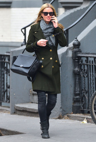 Nicky Hilton strolled the streets of NYC in a green military-style coat, motorcycle-inspired jeans, and a black Céline tote.
Nicky Hilton strolled the streets of NYC in a green military-style coat, motorcycle-inspired jeans, and a black Céline tote.
