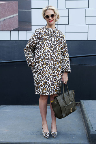 Leopard prints, right down to her toes, put this showgoer's look on our radar.
Leopard prints, right down to her toes, put this showgoer's look on our radar.