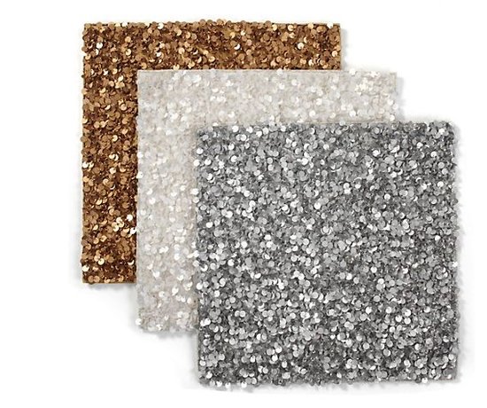 Keep your tablecloth pristine and party-ready with sequined place mats ($120 for four).
Keep your tablecloth pristine and party-ready with sequined place mats ($120 for four).