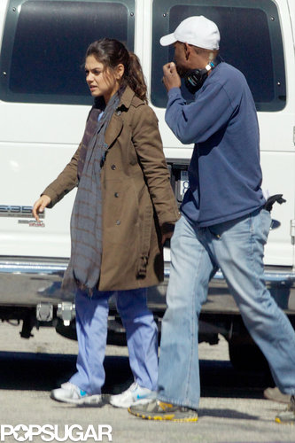 Mila Kunis talked to crew members while on set in LA on Wednesday.
Mila Kunis talked to crew members while on set in LA on Wednesday.