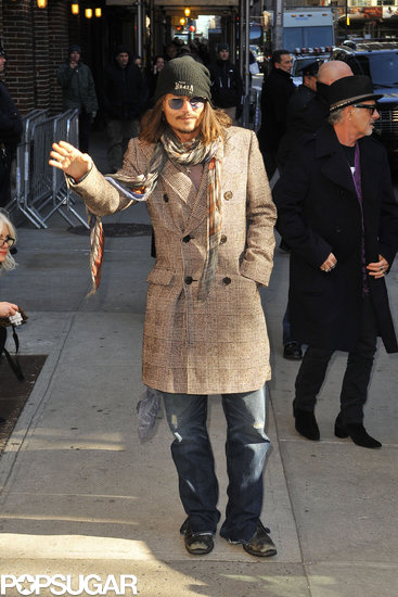 Johnny Depp wore a plaid overcoat and black cap to stop by the Late Show in NYC.
Johnny Depp wore a plaid overcoat and black cap to stop by the Late Show in NYC.