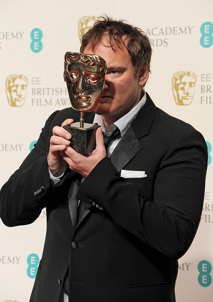 Quentin Tarantino played around with his BAFTA Award for best original screenplay in the press room.
Quentin Tarantino played around with his BAFTA Award for best original screenplay in the press room.