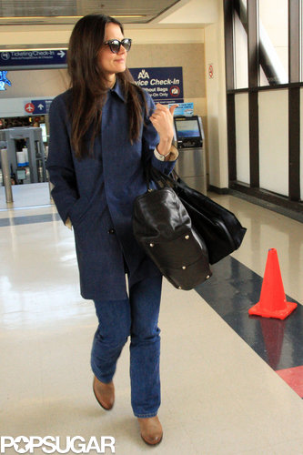 Katie Holmes wore a navy coat when she arrived at LAX on Wednesday.
Katie Holmes wore a navy coat when she arrived at LAX on Wednesday.