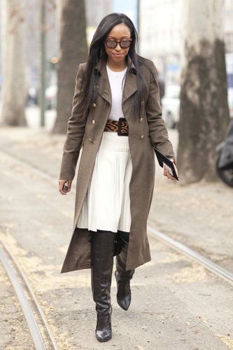Shiona Turini made creamy white hues Winter-ready with a military-style coat and Alexander Wang's tough, sexy thigh-high boots.
Shiona Turini made creamy white hues Winter-ready with a military-style coat and Alexander Wang's tough, sexy thigh-high boots.