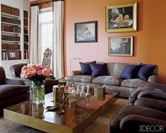 In her East Hampton home, Aerin added metallic accents to a punchy eggplant-and-tangerine color palette for a rich, sophisticated living room.
Source: Elle Decor
In her East Hampton home, Aerin added metallic accents to a punchy eggplant-and-tangerine color palette for a rich, sophisticated living room.
Source: Elle Decor