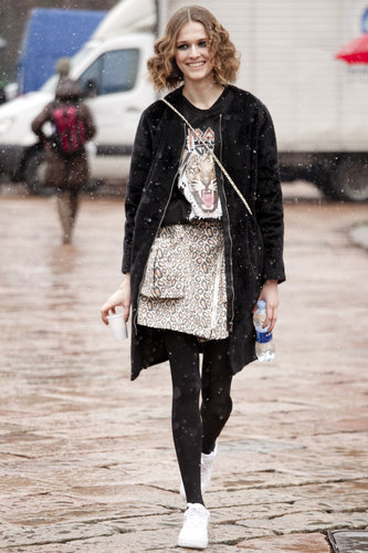 This showgoer carried the wild-cat theme through on her t-shirt and leopard-print skirt.
This showgoer carried the wild-cat theme through on her t-shirt and leopard-print skirt.