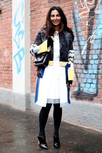 A statement coat and sleek LWD were perfect opposites against black tights and patent booties.
A statement coat and sleek LWD were perfect opposites against black tights and patent booties.