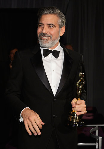 George Clooney had a smile on his face at the Governors Ball.
George Clooney had a smile on his face at the Governors Ball.