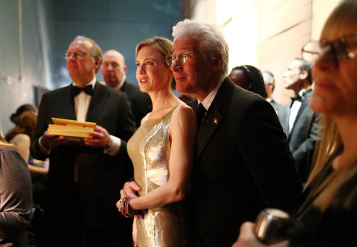 Renée Zellweger and Richard Gere backstage at the Oscars.
Renée Zellweger and Richard Gere backstage at the Oscars.