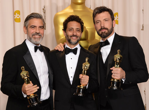 George Clooney, Ben Affleck, and Grant Heslov showed off their Oscars int he press room.
George Clooney, Ben Affleck, and Grant Heslov showed off their Oscars int he press room.