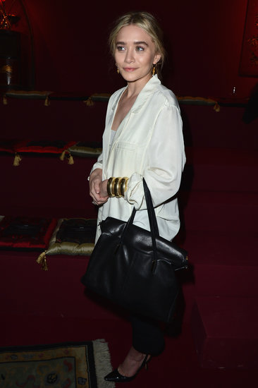 Ashley Olsen donned a black-and-white palette at the H&M fashion show, then finished the look off with three gold bangles.
Ashley Olsen donned a black-and-white palette at the H&M fashion show, then finished the look off with three gold bangles.
