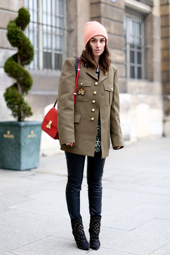 She softened up a military topper with a pastel beanie and cool-girl booties.
She softened up a military topper with a pastel beanie and cool-girl booties.