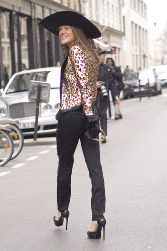 Anna Dello Russo was all smiles in a bold mix in leopard and a wide-brimmed hat.
Anna Dello Russo was all smiles in a bold mix in leopard and a wide-brimmed hat.