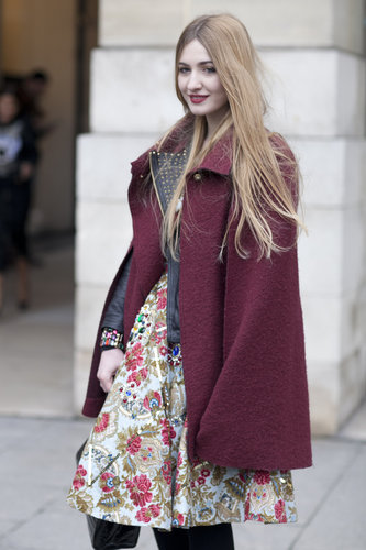 The rich maroon on her coat kept this showgoer's florals from feeling too much like Spring.
The rich maroon on her coat kept this showgoer's florals from feeling too much like Spring.