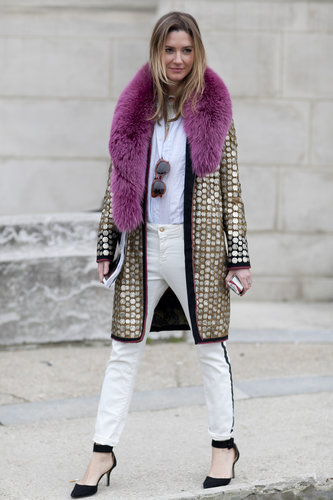 Understated layers got a glamorous counterpart in this showgoer's fur-collared, metallic coat.
Understated layers got a glamorous counterpart in this showgoer's fur-collared, metallic coat.