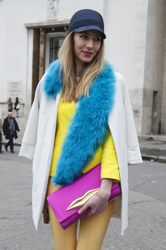 The range of brights in this attendee's look caught our attention outside the shows.
The range of brights in this attendee's look caught our attention outside the shows.