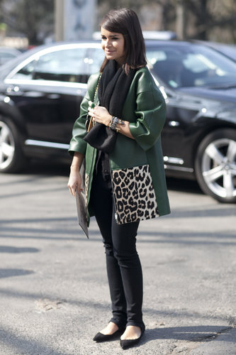 Miroslava Duma gave skinny bottoms a bold complement with an emerald-hued and leopard-print leather topper.
Miroslava Duma gave skinny bottoms a bold complement with an emerald-hued and leopard-print leather topper.