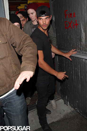 Taylor Lautner went to a concert with Kristen Stewart and a group of friends.
Taylor Lautner went to a concert with Kristen Stewart and a group of friends.