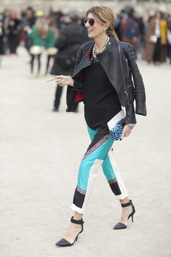 A moto jacket toughened up printed trousers and statement baubles.
A moto jacket toughened up printed trousers and statement baubles.