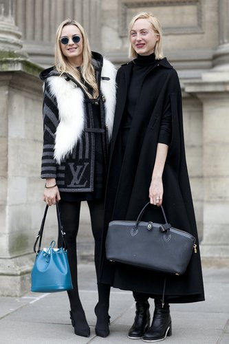 This duo brought two different takes to the show — a touch of fur and a bright bag at left, and the right was all about chic outerwear.
This duo brought two different takes to the show — a touch of fur and a bright bag at left, and the right was all about chic outerwear.