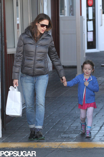 Jennifer Garner wore a warm jacket while Seraphina kept warm in a little blue zip-up. Jennifer Garner wore a warm jacket while Seraphina kept warm in a little blue zip-up.