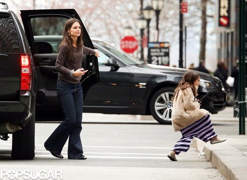 Suri Cruise wore a fluffy coat.
Suri Cruise wore a fluffy coat.