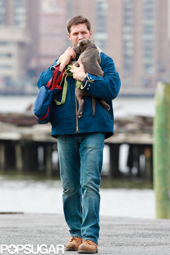 Tom Hardy Cuddles Up to a Canine Costar on Set Tom Hardy Cuddles Up to a Canine Costar on Set