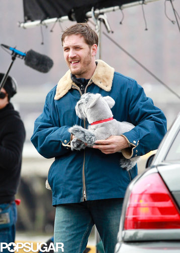 Tom Hardy Cuddles Up to a Canine Costar on Set Tom Hardy Cuddles Up to a Canine Costar on Set