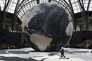 Karl Lagerfeld on the Globe From Chanel's Fall 2013 Show