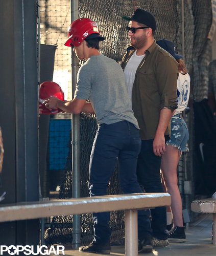 Kristen Stewart and Taylor Lautner hung out at the batting cages with friends.
Kristen Stewart and Taylor Lautner hung out at the batting cages with friends.