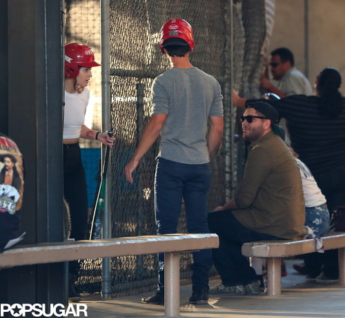 Kristen Stewart and Taylor Lautner hung out at the batting cages with friends.
Kristen Stewart and Taylor Lautner hung out at the batting cages with friends.