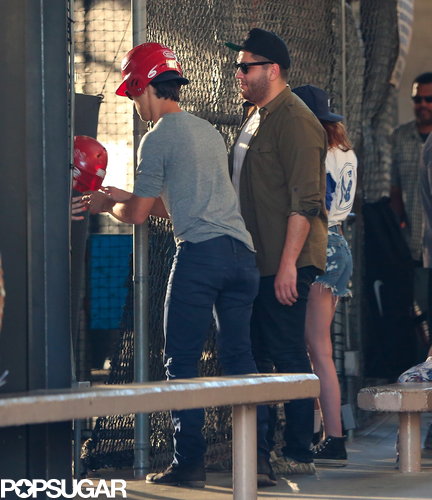 Kristen Stewart and Taylor Lautner hung out at the batting cages with friends.
Kristen Stewart and Taylor Lautner hung out at the batting cages with friends.