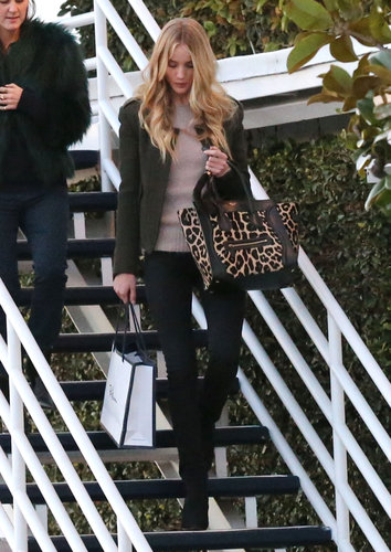 Rosie Huntington-Whiteley put her leopard Céline luggage tote on display during a shopping trip to Fred Segal in LA.
Rosie Huntington-Whiteley put her leopard Céline luggage tote on display during a shopping trip to Fred Segal in LA.