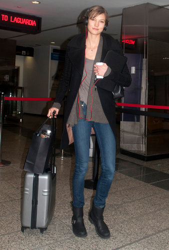 Karlie Kloss's airport style consisted of black moto boots, skinny jeans, and a big black coat.
Karlie Kloss's airport style consisted of black moto boots, skinny jeans, and a big black coat.