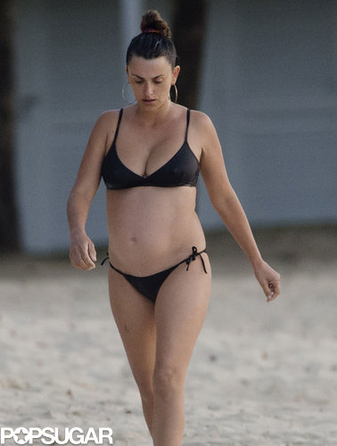 Penélope Cruz showed off her baby bump in a black bikini.
Penélope Cruz showed off her baby bump in a black bikini.