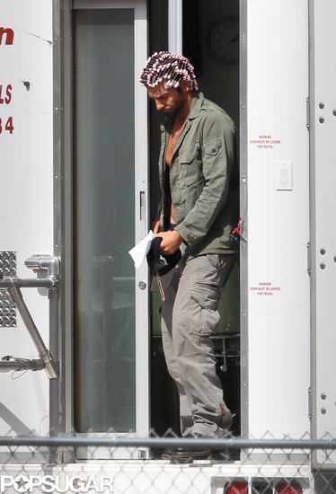Bradley Cooper wore hair curlers and went shirtless under a green jacket in Boston.
Bradley Cooper wore hair curlers and went shirtless under a green jacket in Boston.