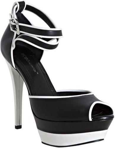BCBGeneration black leather 'Nesta' patent trim platform sandals