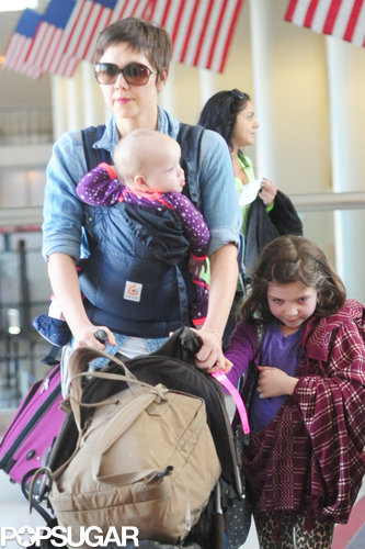 Maggie Gyllenhaal Lands in LA With Her Daughters and a New Pixie Cut Maggie Gyllenhaal Lands in LA With Her Daughters and a New Pixie Cut