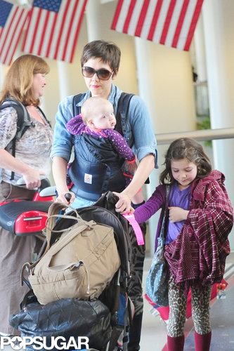Maggie Gyllenhaal Lands in LA With Her Daughters and a New Pixie Cut Maggie Gyllenhaal Lands in LA With Her Daughters and a New Pixie Cut