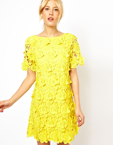 We love the texture of this ASOS yellow flower lace shift dress ($203) and would pair it with white ankle-strap sandals for a fresh-as-flowers feel.
We love the texture of this ASOS yellow flower lace shift dress ($203) and would pair it with white ankle-strap sandals for a fresh-as-flowers feel.