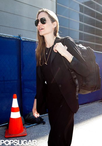 Angelina Denies Wedding Ring Rumors Upon Returning to LA Angelina Denies Wedding Ring Rumors Upon Returning to LA