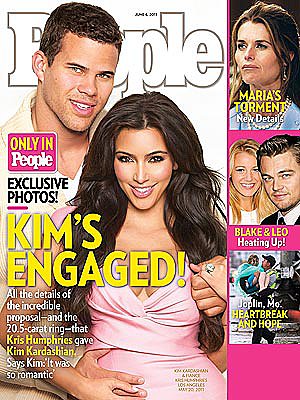 Kim Kardashian and Kris Humphries posed for the cover of People magazine in May 2011 to reveal their engagement.
Kim Kardashian and Kris Humphries posed for the cover of People magazine in May 2011 to reveal their engagement.