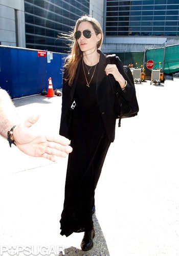 Angelina Denies Wedding Ring Rumors Upon Returning to LA Angelina Denies Wedding Ring Rumors Upon Returning to LA