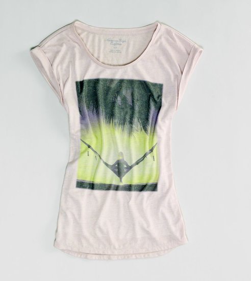 This American Eagle Photo Real T ($25) is just waiting to be taken on a vacation and worn with a pair of loose-fitting printed pants.
This American Eagle Photo Real T ($25) is just waiting to be taken on a vacation and worn with a pair of loose-fitting printed pants.