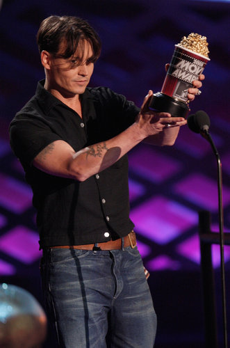 Johnny Depp came to the 2008 awards to accept his trophy for best villain in Sweeney Todd.
Johnny Depp came to the 2008 awards to accept his trophy for best villain in Sweeney Todd.