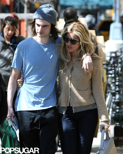 Tom Sturridge cuddled up to Sienna Miller in NYC on Wednesday.
Tom Sturridge cuddled up to Sienna Miller in NYC on Wednesday.