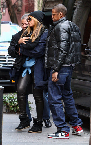 Beyoncé carried baby Blue Ivy in slick leather pants and a black beanie, while Jay-Z followed behind in a stylish puffer jacket and Nikes in February 2012.
Beyoncé carried baby Blue Ivy in slick leather pants and a black beanie, while Jay-Z followed behind in a stylish puffer jacket and Nikes in February 2012.